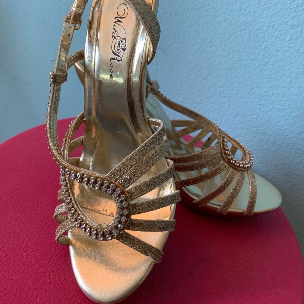 Gold sparkling heels